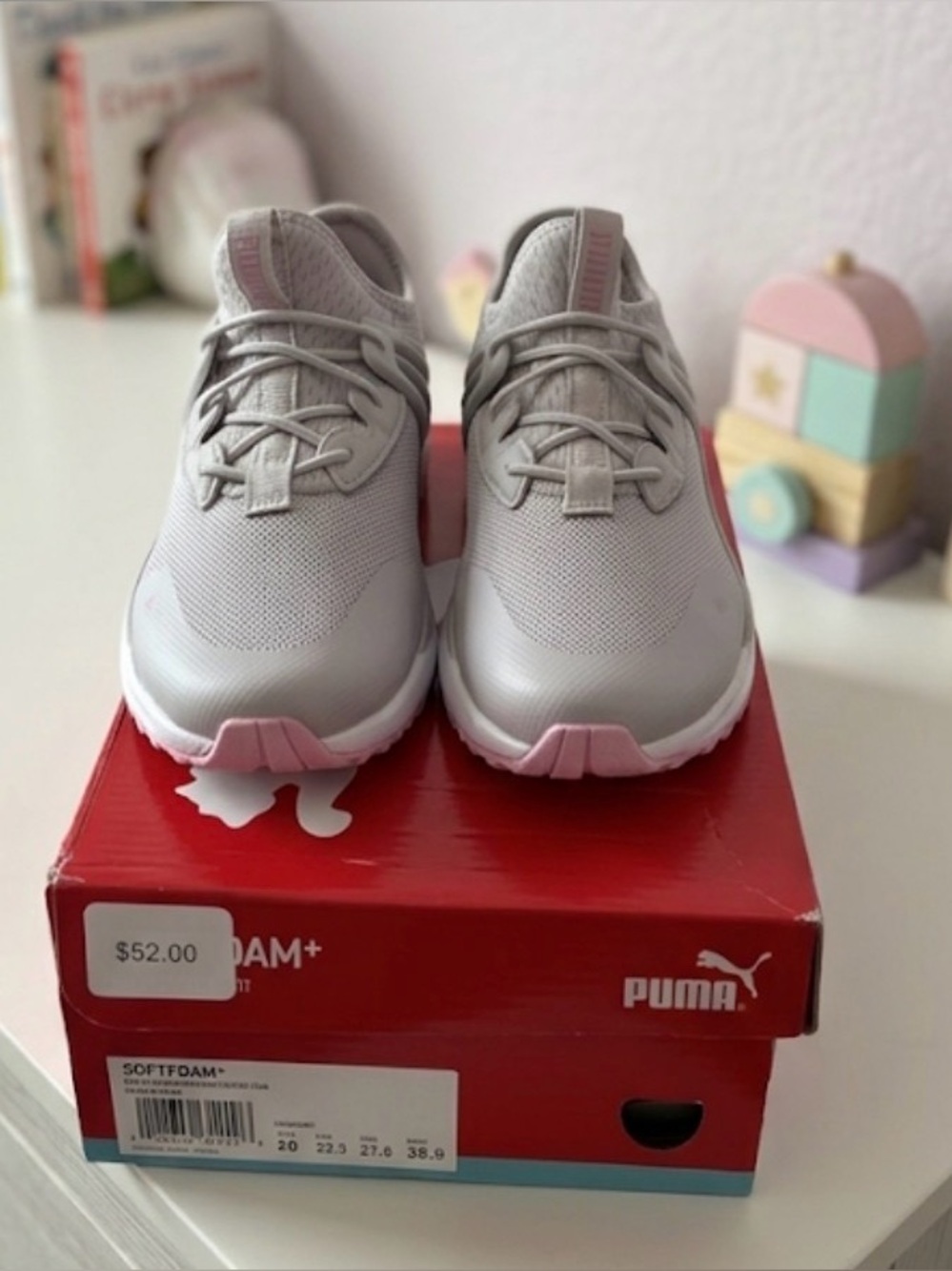 New light grey Puma sneakers with pink accents features a SoftFoam+ sockline